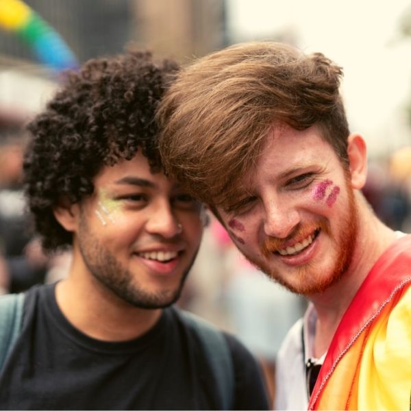 Gay Couple Taking a selfie in Gay Pride Parade