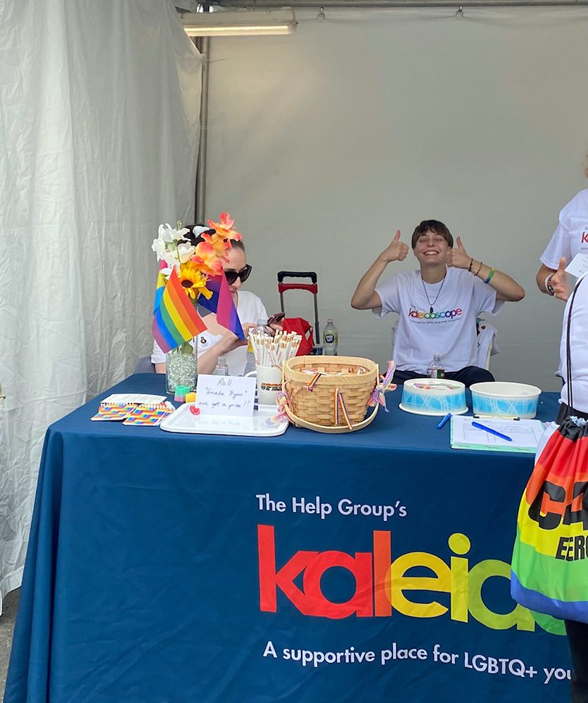 Staff members a the Kaleidoscope pride booth