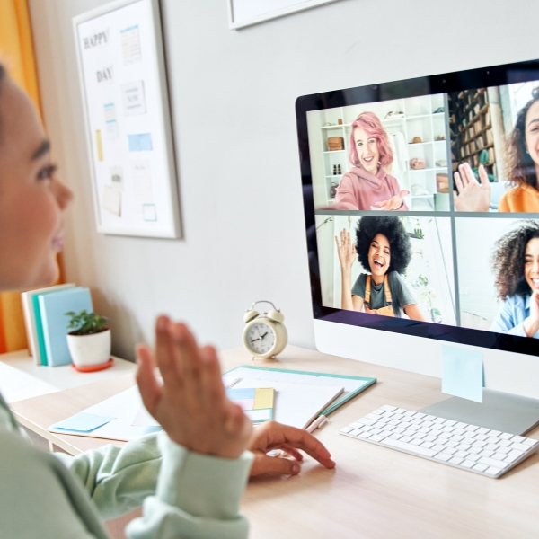 Young teenage girl on a video meeting with other teens